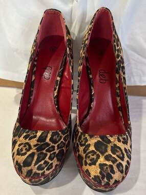 Deb Leopard Print Platform Pumps with Red Stiletto Heels
S1